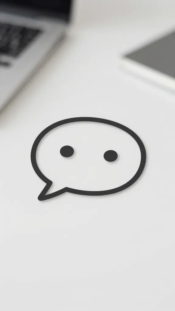 closeup of a single chatbot icon on a clean desk surface